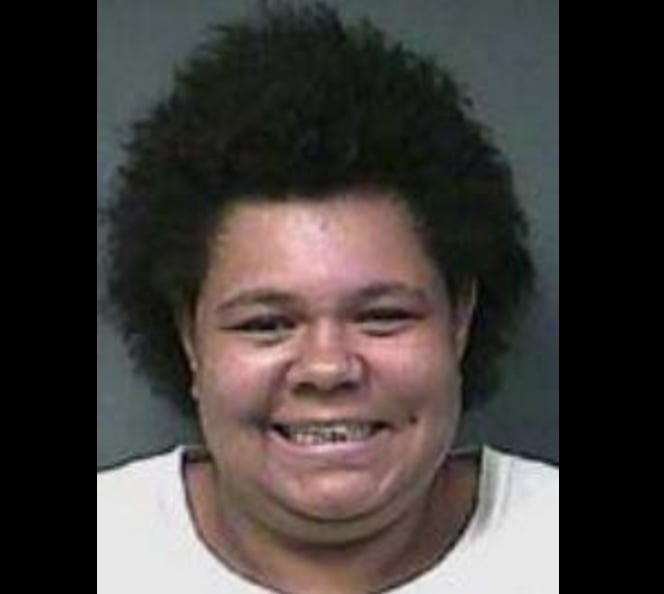 accused of trying to remove body from casket during funeral