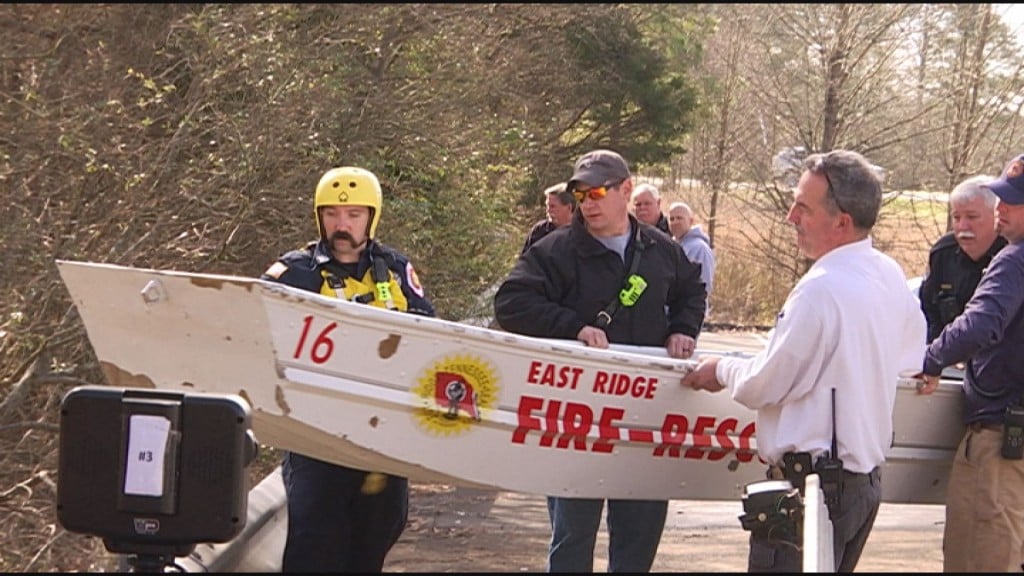 East Ridge rescue crews work to save a man from the Chickamauga Creek