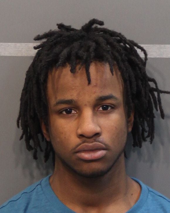 mug shot of shooting victim with warrants