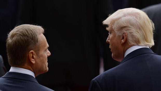 US President Donald Trump (L) speaks with President of the European Council Donald Tusk on their way to the Hotel San Domenico during the Heads of State and of Government G7 summit