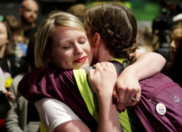 Activists react at the count centre as votes are tallied folowing yesterday's referendum on liberalizing abortion law