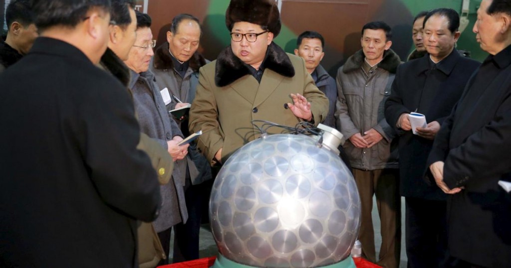 North Korean leader Kim Jong Un meets scientists and technicians in the field of researches into nuclear weapons in this undated photo released by North Korea's Korean Central News Agency (KCNA) in Pyongyang March 9