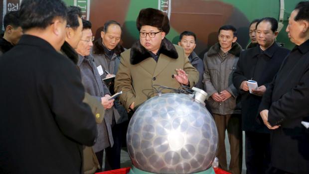 North Korean leader Kim Jong Un meets scientists and technicians in the field of researches into nuclear weapons in this undated photo released by North Korea's Korean Central News Agency (KCNA) in Pyongyang March 9