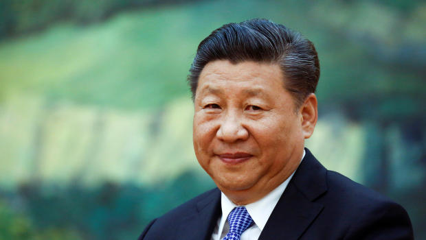 Chinese President Xi Jinping meets Britain's Prince Andrew (not pictured) at the Great Hall of the People in Beijing