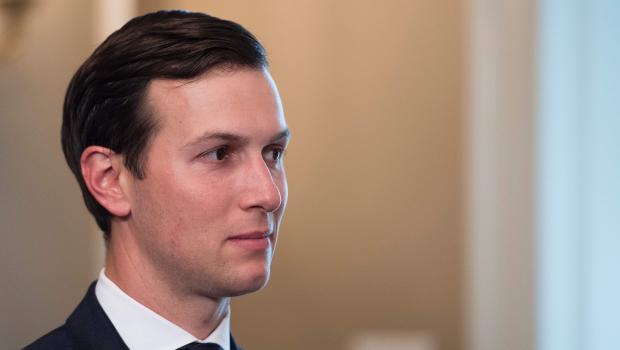 Senior Advisor Jared Kushner listens as US President Donald Trump speaks to the press on August 11