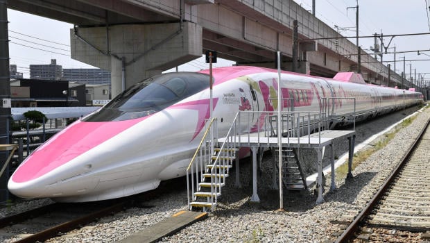 West Japan Railway Co. (JR-West) unveils a Shinkansen bullet train featuring Hello Kitty during the press preview ahead of its debut on June 30