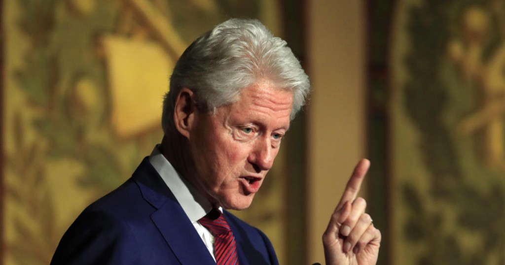 Former President Bill Clinton speaks at a symposium in Georgetown University in Washington