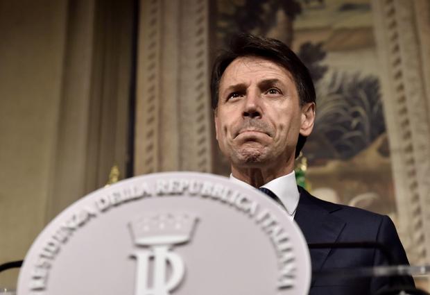 TOPSHOT - Italy's newly appointed Prime minister Giuseppe Conte announces the list of his government at the Quirinale presidential palace on May 31