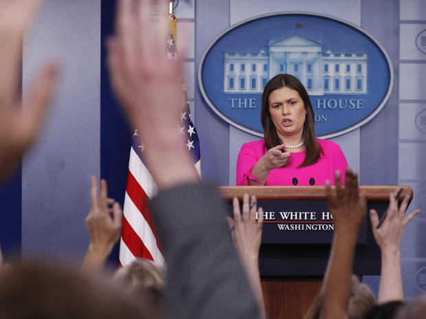 White House press secretary Sarah Huckabee Sanders points as she fields questions from members of the media during the daily briefing in the Brady Press Briefing Room of the White House