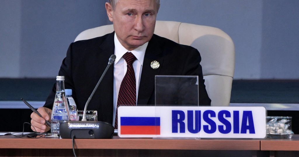 Russian President Vladimir Putin attends a session of the BRICS summit in Johannesburg