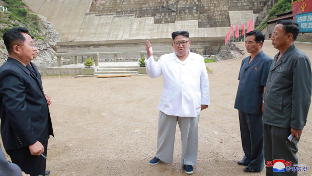 North Korean leader Kim Jong Un gives field guidance during his visit to the under construction Orangchon Power Station in this undated photo released by North Korea's Korean Central News Agency (KCNA) in Pyongyang July 17