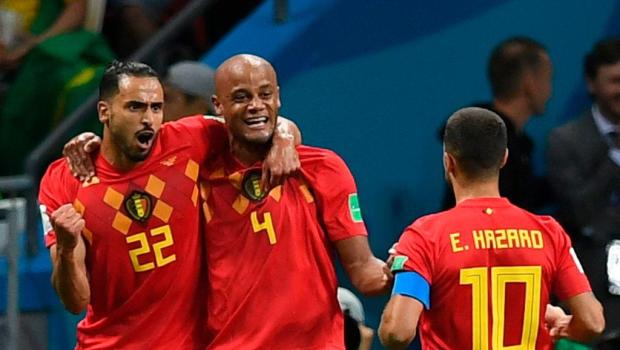 Belgium's midfielder Nacer Chadli (L)