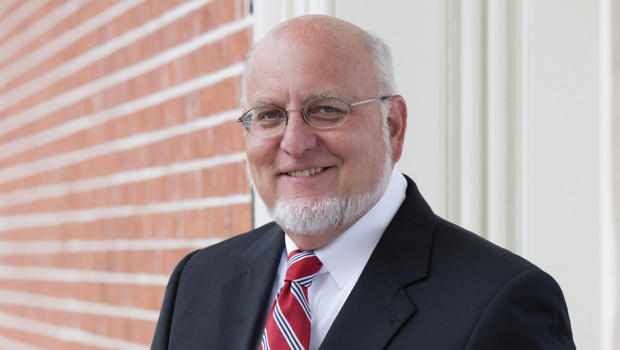 This undated photo provided by the University of Maryland School of Medicine in March 2018 shows Dr. Robert Redfield Jr. On Wednesday
