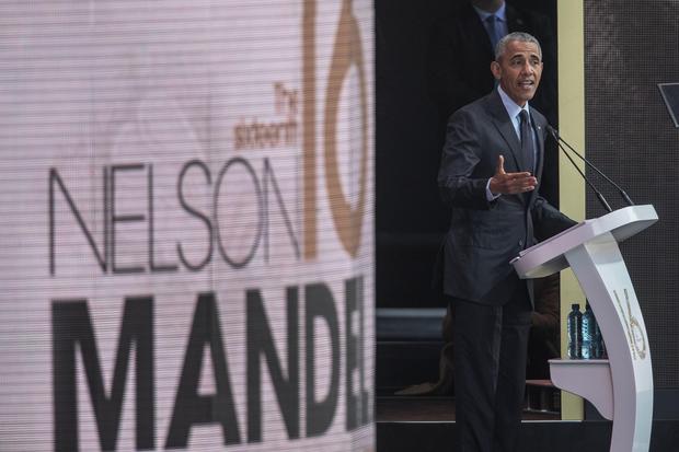 Former US President Barack Obama speaks during the 2018 Nelson Mandela Annual Lecture at the Wanderers cricket stadium in Johannesburg on July 17