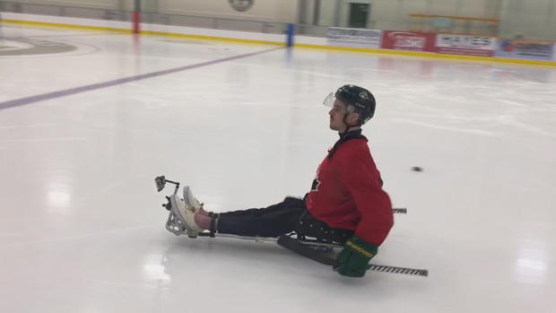 ryan-playing-sledge-hockey-vo-frame-139.jpg 