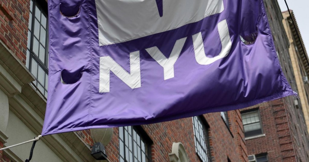 A flag flies from a building at New York University May 4
