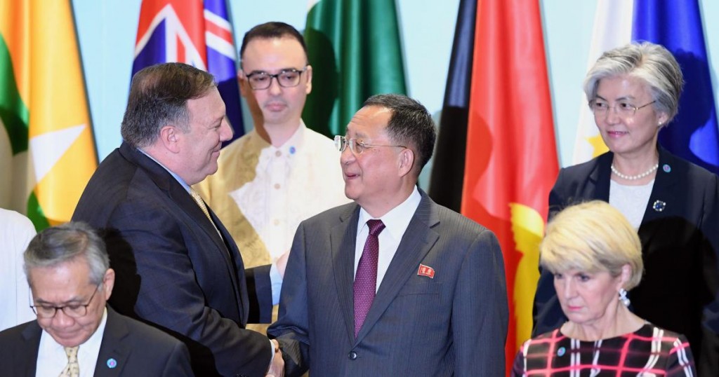 US Secretary of State Mike Pompeo (2nd L) shakes hands with North Korea's Foreign Minister Ri Yong Ho (C) as Philippine Foreign Secretary Alan Peter Cayetano (behind) and South Korea's Foreign Minister Kang Kyung-wha (top R) look on