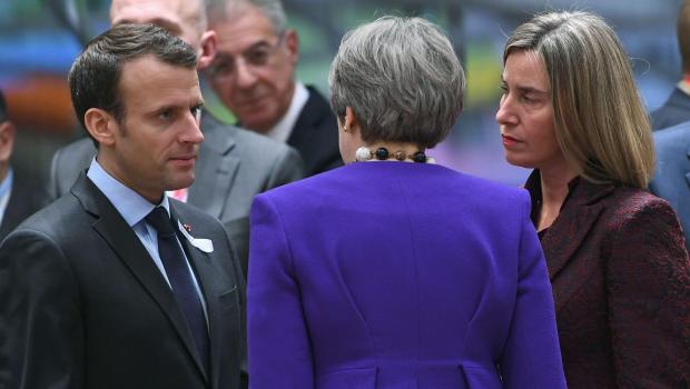TOPSHOT - (From L) France's President Emmanuel Macron