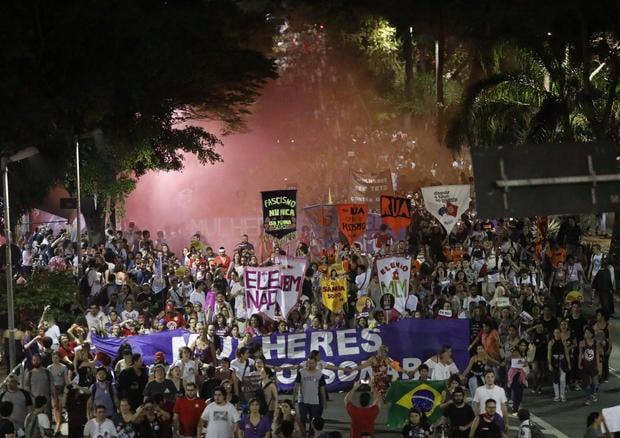 People march during a demonstration against Brazil's presidential candidate Jair Bolsonaro