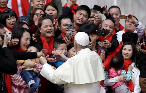 Pope Francis meets a group of faithful from China at the end of his weekly general audience in St. Peter's Square