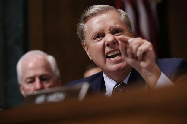 Senate Judiciary Committee member Sen. Lindsey Graham (R-SC) shouts while questioning Judge Brett Kavanaugh during his Supreme Court confirmation hearing in the Dirksen Senate Office Building on Capitol Hill in Washington
