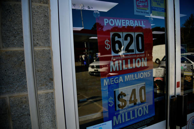 A sign advertising the next Powerball and Mega Millions jackpots at the KC Mart in Simpsonville