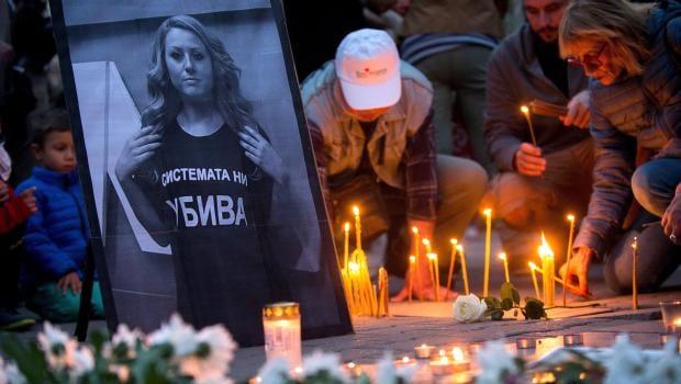 People take part in a vigil in memory of murdered Bulgarian TV journalist Viktoria Marinova in Sofia on October 8