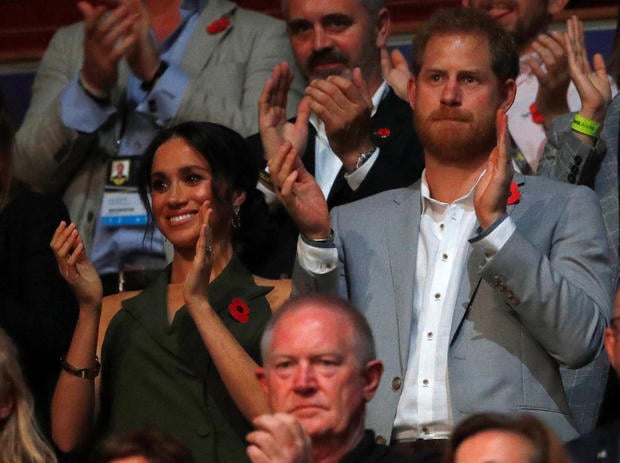 Britain's Prince Harry and Meghan