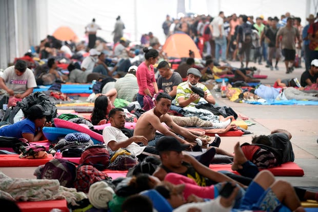 Central American migrants - mostly Hondurans-  taking part in a caravan heading to the US