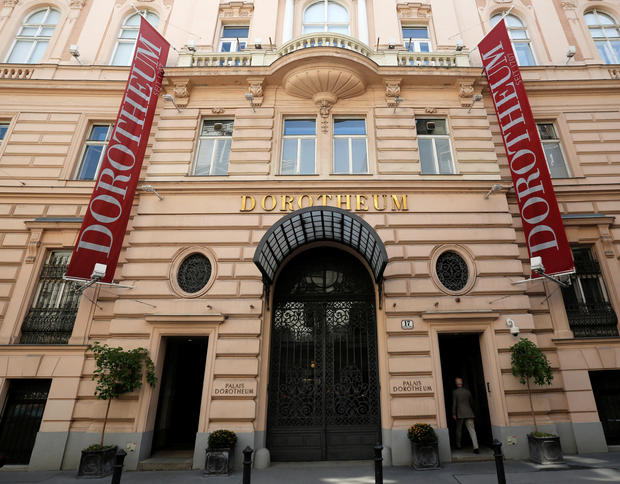 A man enters the Austrian auction house Dorotheum in Vienna April 28, 2014. 