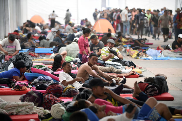 Central American migrants - mostly Hondurans-  taking part in a caravan heading to the US