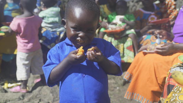 child-eating-orange-fleshed-sweet-potatoes-2.jpg 