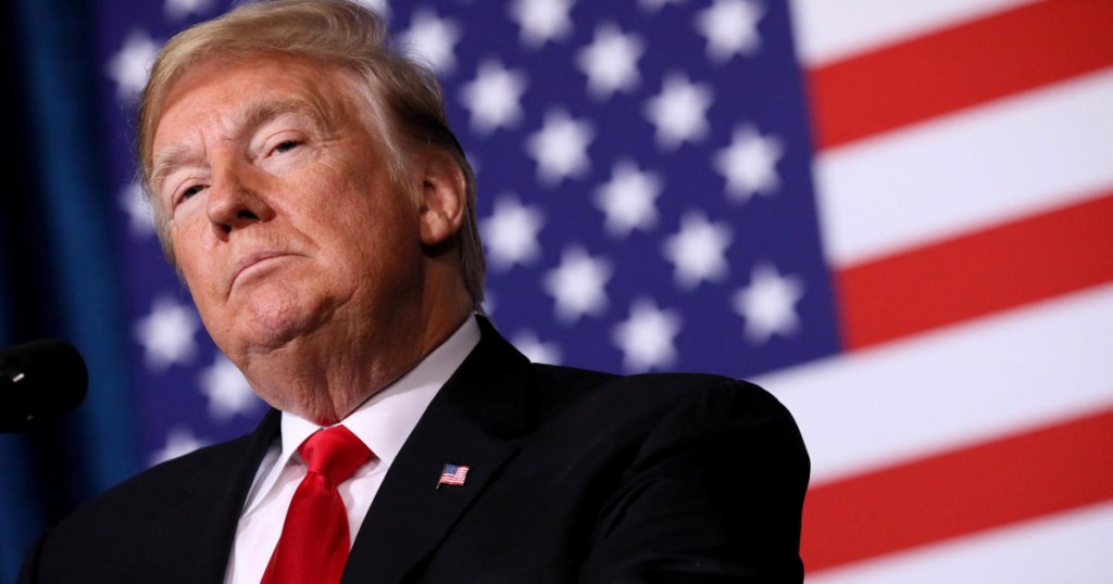 U.S. President Donald Trump pauses while delivering remarks at the Project Safe Neighborhoods National Conference in Kansas City
