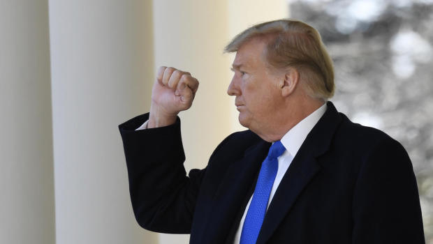 President Donald Trump turns back to the audience after speaking during an event in the Rose Garden at the White House in Washington