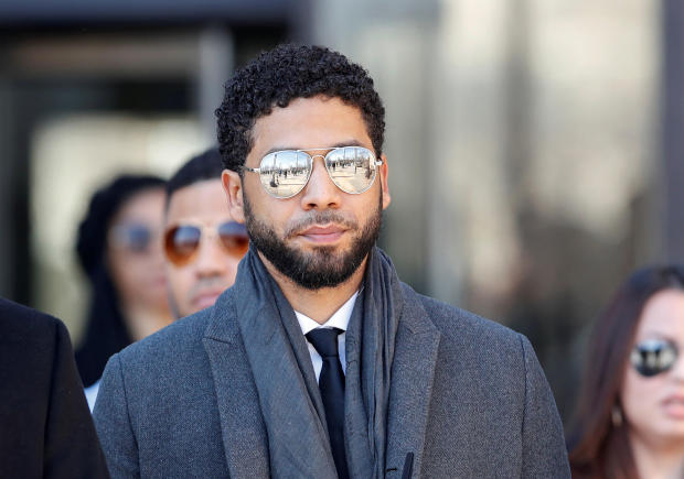 Actor Jussie Smollett leaves the Leighton Criminal Court Building after attending a hearing on whether cameras will be allowed in future proceedings of his trial on felony charges
