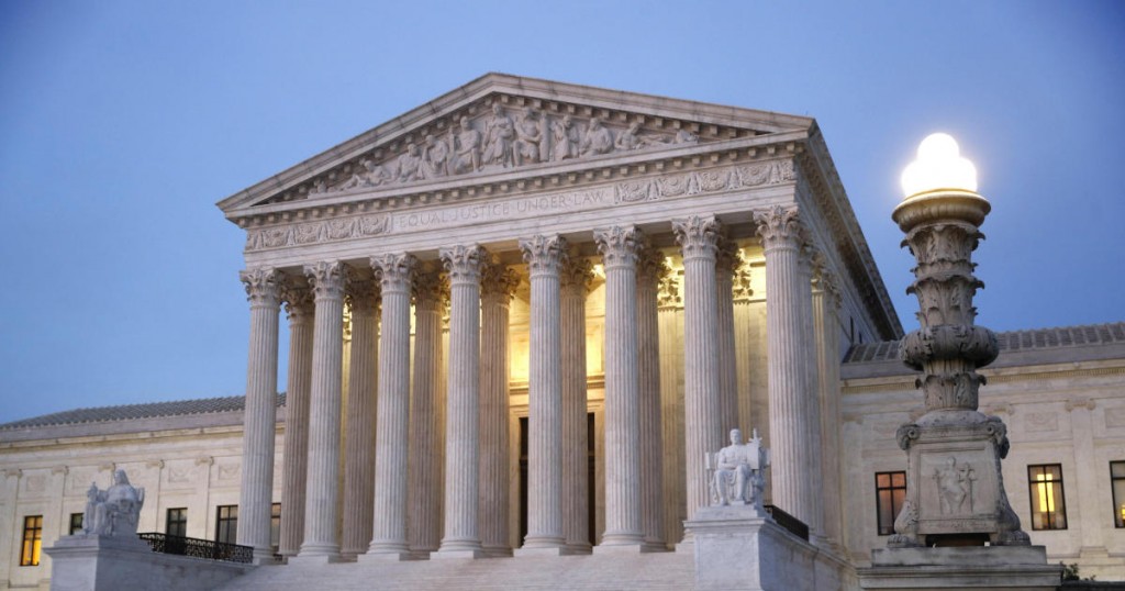 The U.S. Supreme Court building at dusk