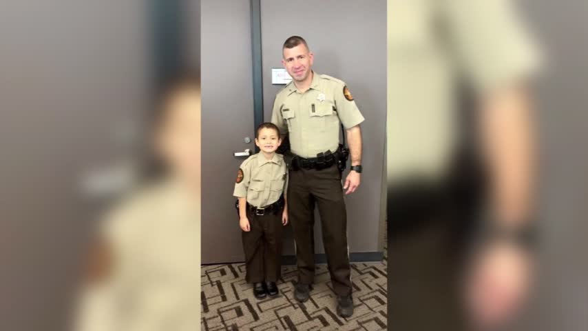 family giving away backpacks to remember their son