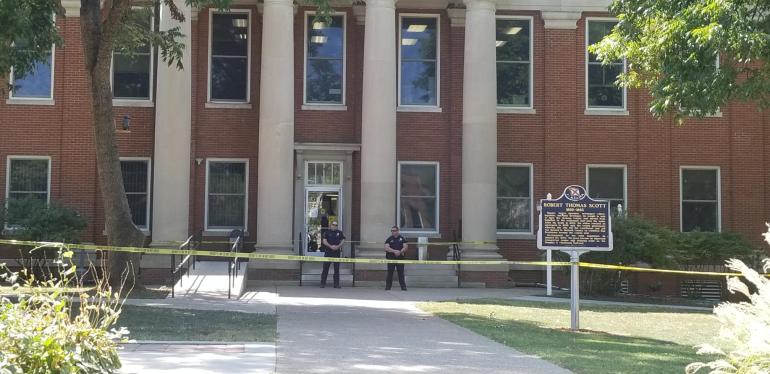 armed man shot at courthouse