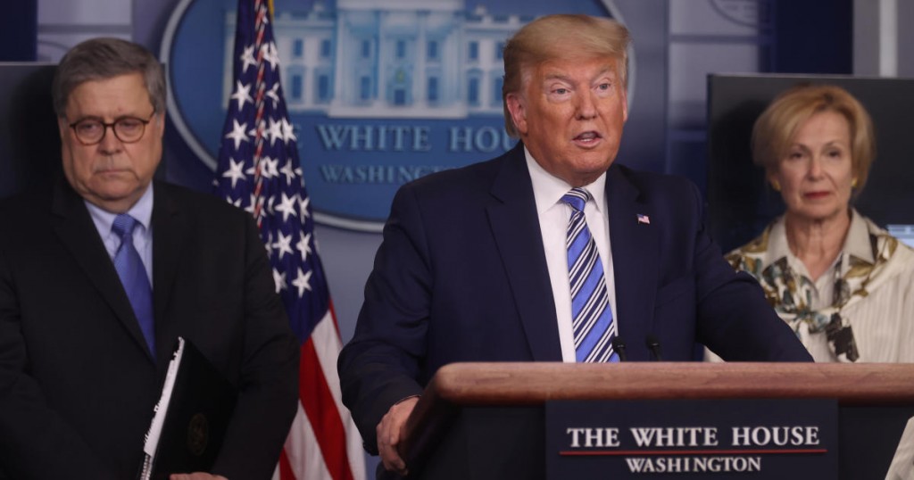 U.S. President Donald Trump addresses the coronavirus response daily briefing flanked by Attorney General William Barr and Ambassador Debbie Birx