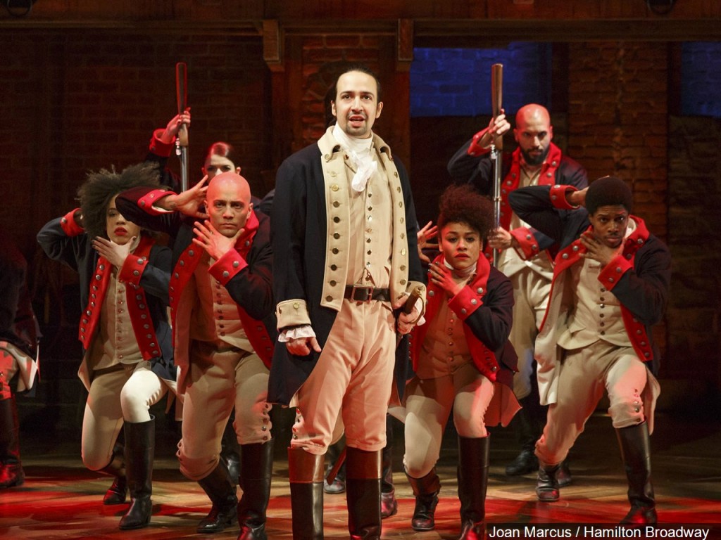 Lin-Manuel Miranda (center) & the cast of the Broadway play "Hamilton"