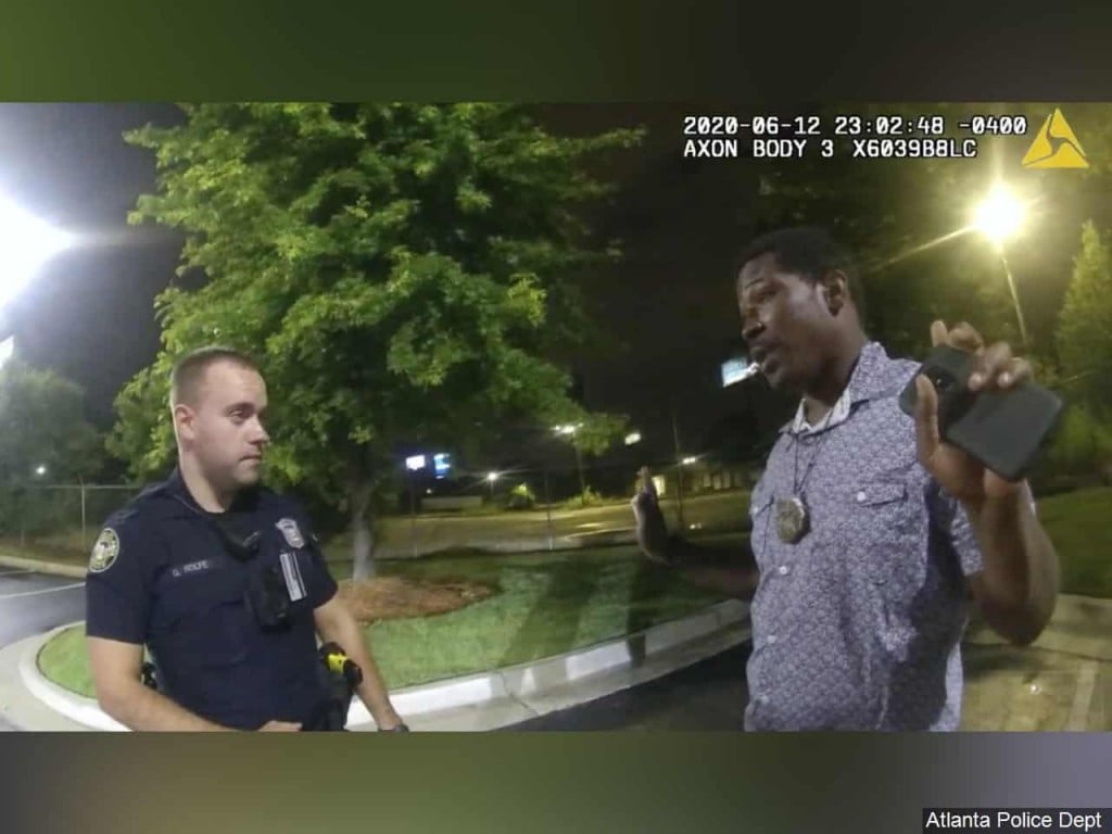 Body cam footage of Rayshard Brooks speaking with Officer Garrett Rolfe in the parking lot of a Wendy's restaurant in Atlanta