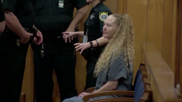 Woman Sentenced Father Stabbed Nearly 70 Times