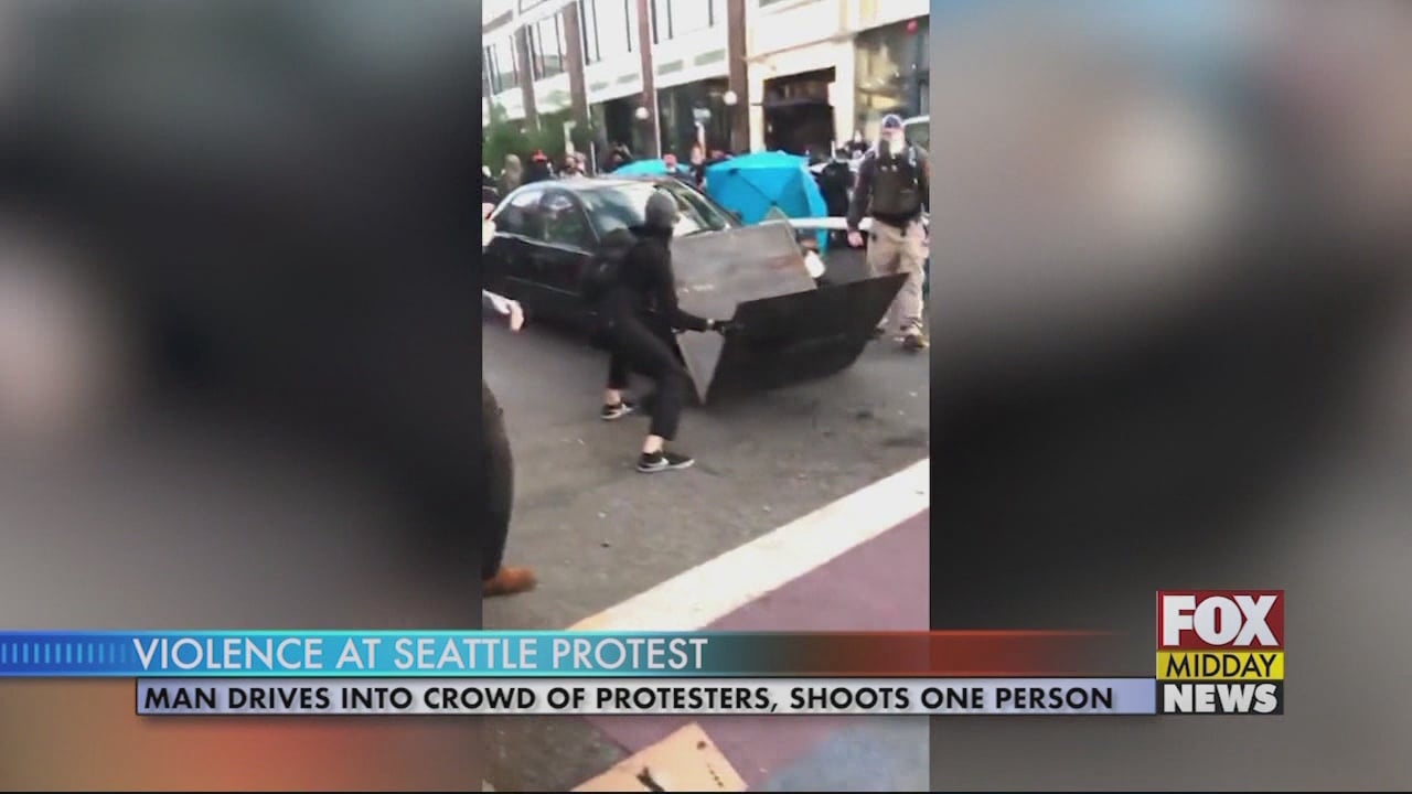 Suspect Drives Vehicle Into Crowd Of Seattle Protesters Shoots One Of Them Wfxb 2079