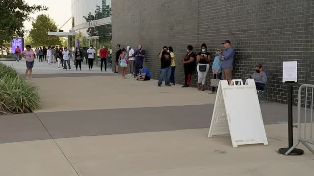 Early Voters Braving Miserably Long Lines Shatter Records