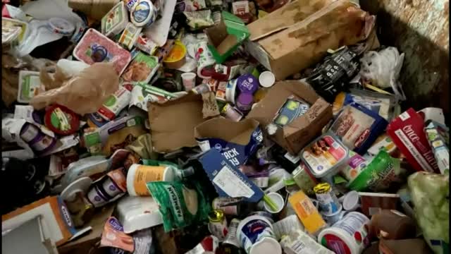 Grocery Store Guards Mountains Of Discarded Food