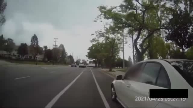 Woman Calls Ofcr Murderer, "you'll Never Be White"