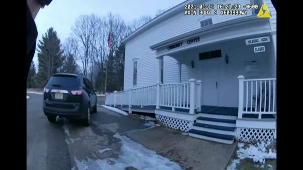 Mi: Body Cam Video Shows Men Breaching Voting Machine