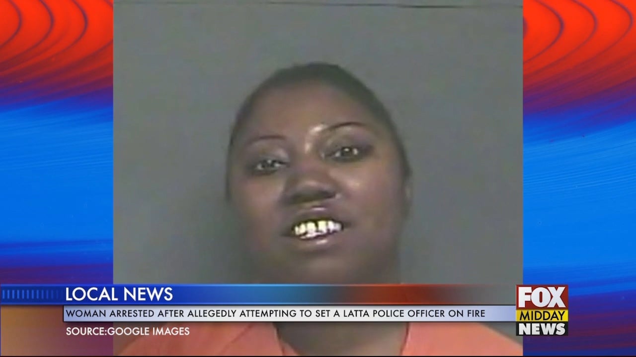 Woman Arrested For Attempting To Light Officer On Fire - WFXB