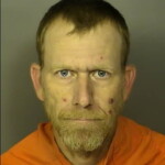 Martin William Brooks Improper Turn Driving Under Suspension Shoplifting