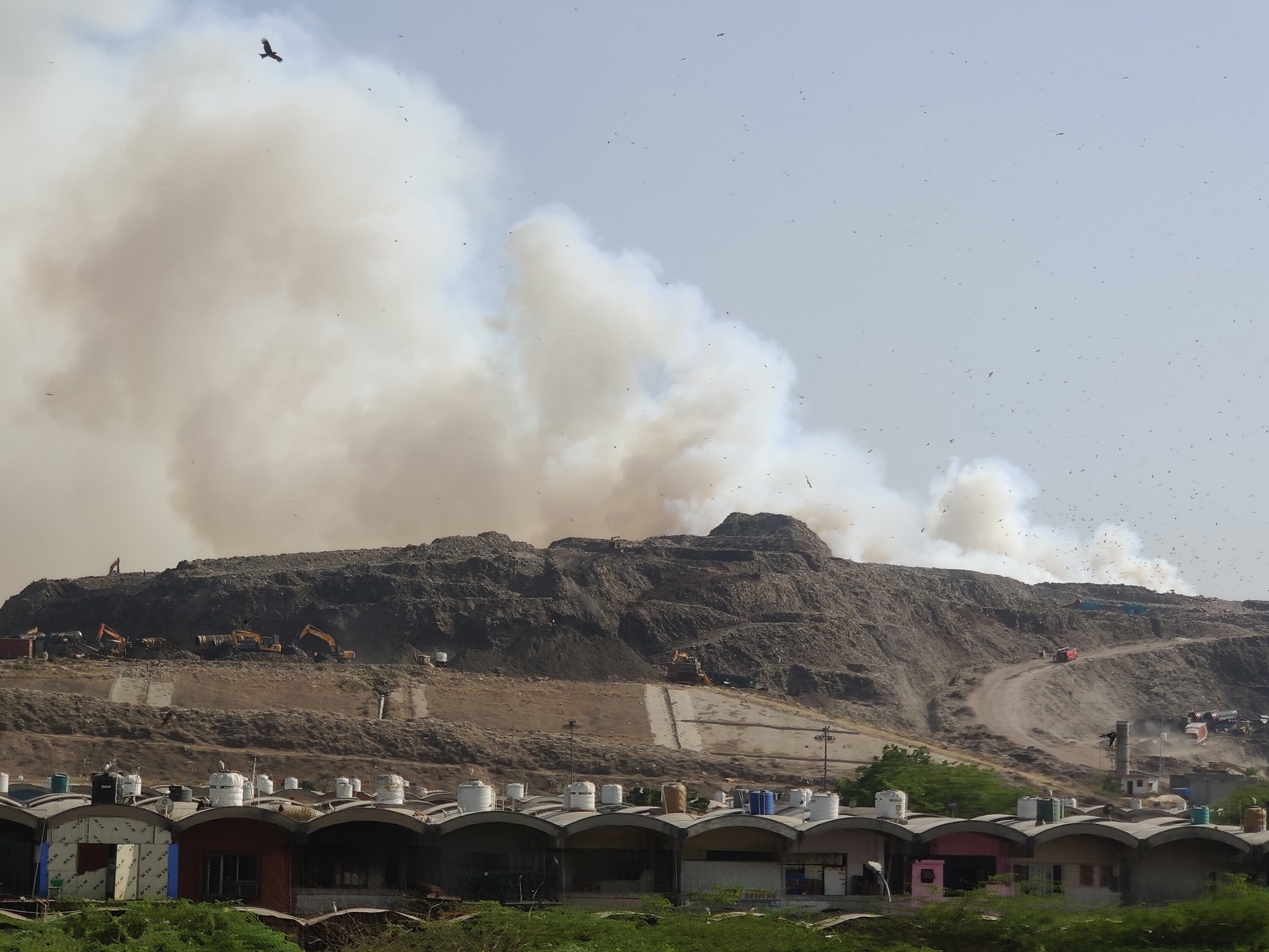 Indian firefighters battle Delhi landfill blaze as air fills with toxic ...